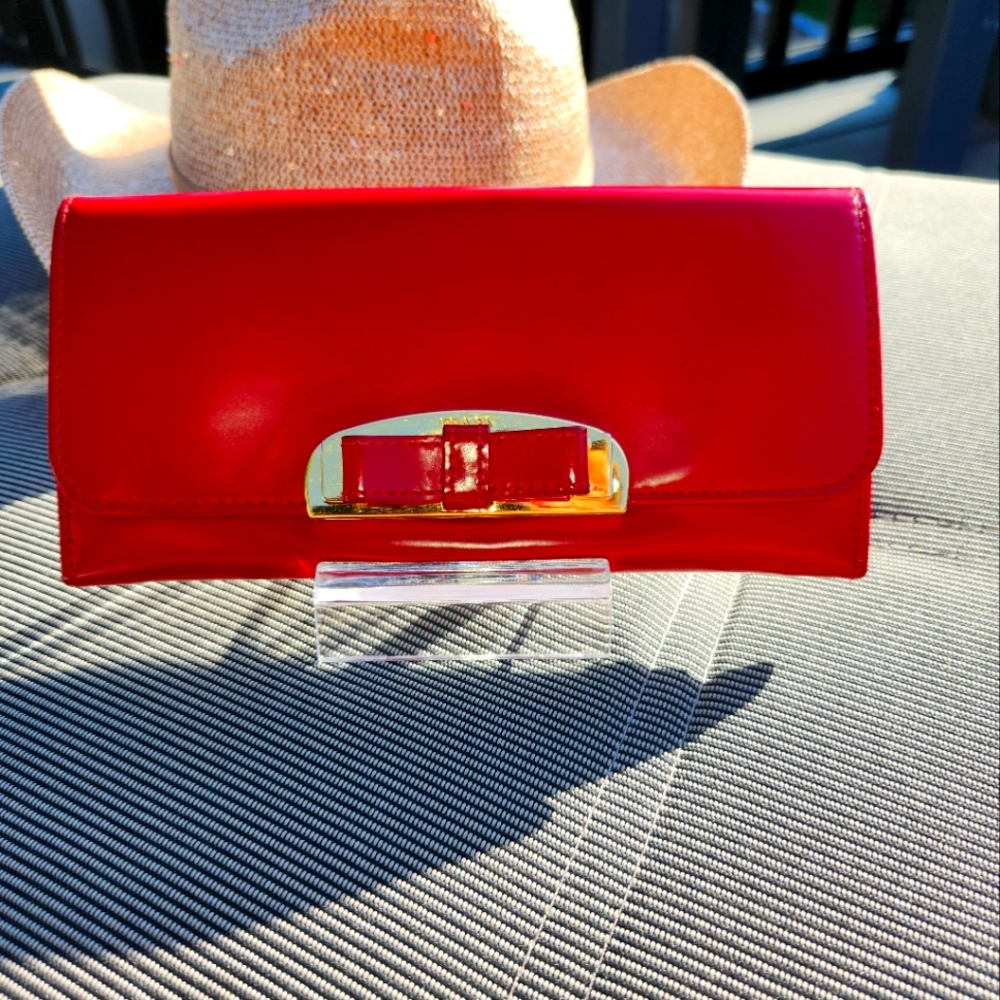 Prada Red Leather Wallet With Ribbon Motif COA Included.
